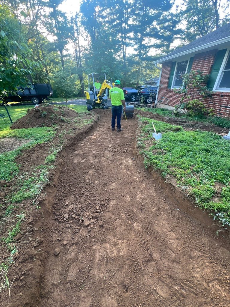 Grading and lawn prep in progress by Hill Landscaping in Clinton Township