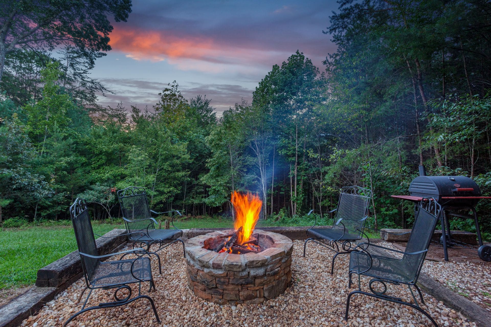 Backyard fire pit with surrounding seating area